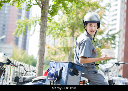 Livreur à emporter Banque D'Images