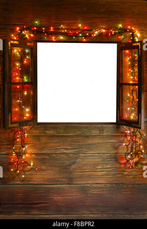 Fenêtre en bois avec des lumières de Noël Banque D'Images