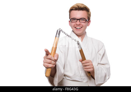 Funny karate fighter avec nunchucks on white Banque D'Images