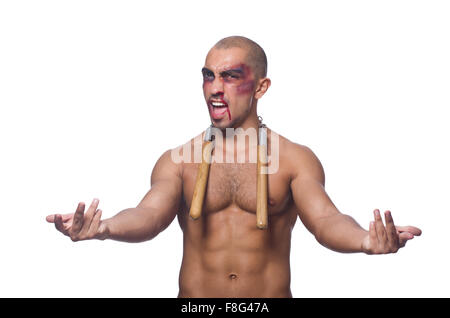 Homme avec nunchucks isolated on white Banque D'Images