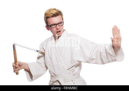 Funny karate fighter avec nunchucks on white Banque D'Images