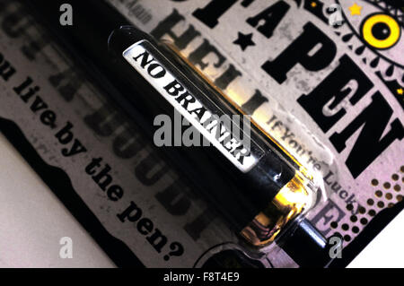 Un message sur une prédiction pen photographié sur un fond blanc. Banque D'Images