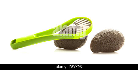 Les avocats avec slicer isolé sur fond blanc Banque D'Images