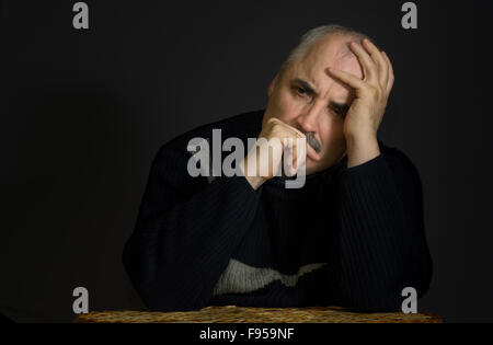 Portrait of mature man in low key Banque D'Images