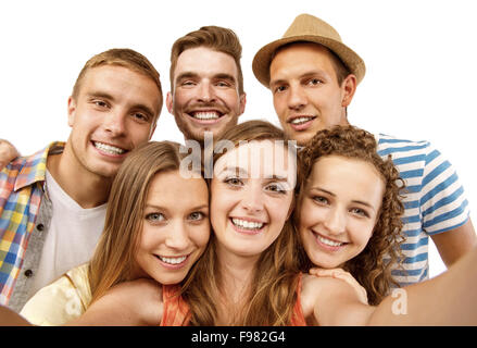 Groupe de professionnels jeune adolescent students taking photo selfies isolé sur fond blanc Banque D'Images