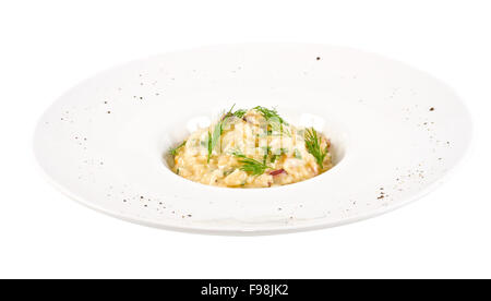 Photo de délicieux risotto aux fruits de mer et de l'aneth sur elle Banque D'Images