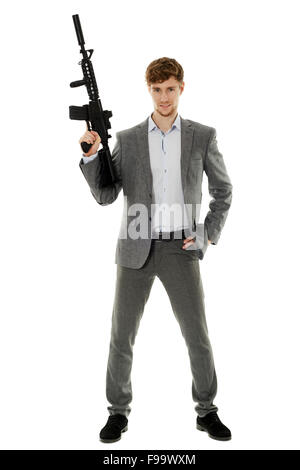 Handsome businessman avec machine gun isolated on white Banque D'Images