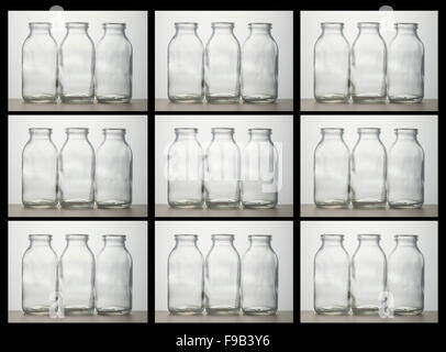 Caisse de bouteilles de lait. 27 bouteilles de lait en verre en caisse. Motif répété, bords noirs. Banque D'Images