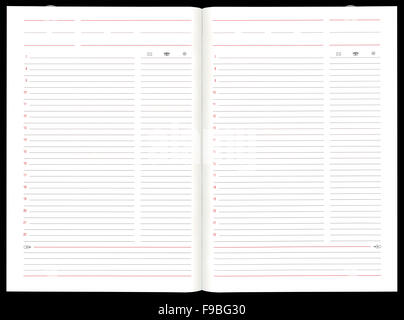 Ordinateur portable blanc double page sur un fond noir Banque D'Images