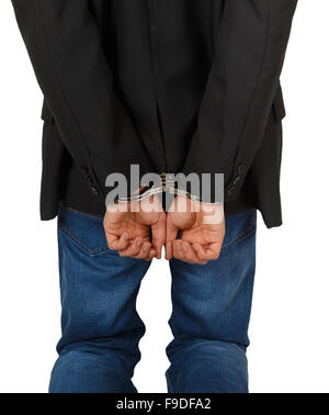 Businessman in handcuffs standing isolé sur fond blanc Banque D'Images
