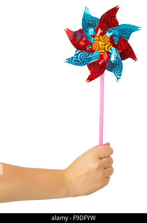 Enfants colorés en moulinet main femelle isolé sur fond blanc Banque D'Images