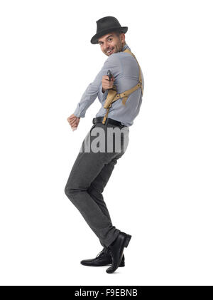 Businessman with gun posing portrait isolé sur fond blanc Banque D'Images