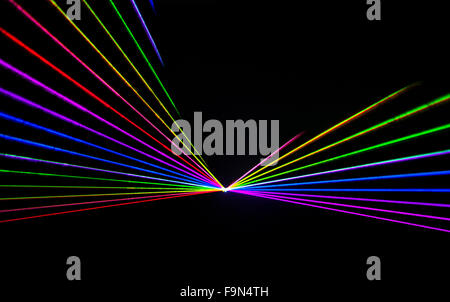 Effet Laser colorés sur un fond noir. Banque D'Images