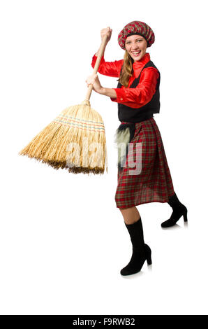 Femme drôle en vêtements écossais avec broom Banque D'Images