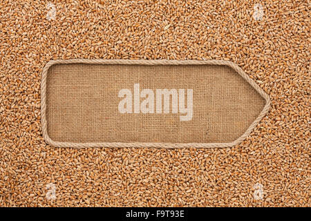 Fait à partir de pointeur avec corde de blé céréales se coucher sur le sac, avec l'espace pour votre texte Banque D'Images