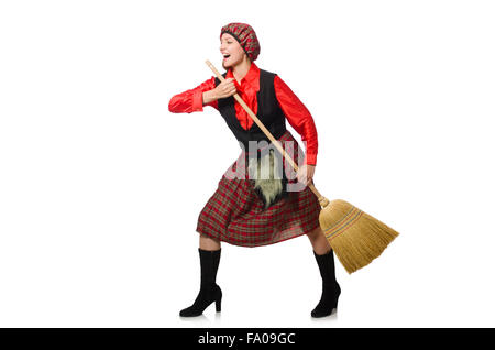 Femme drôle en vêtements écossais avec broom Banque D'Images