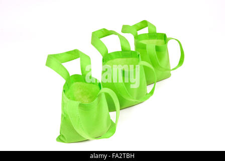 Trois sacs en tissu vert néon Banque D'Images