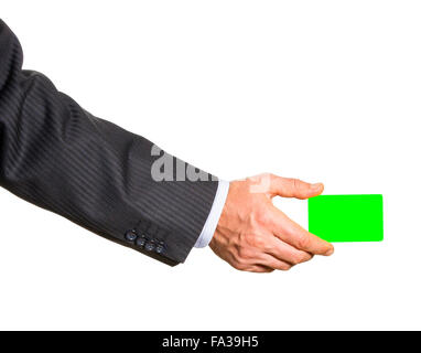 Carte en plastique blanc dans l'homme de main. Isolated on white Banque D'Images