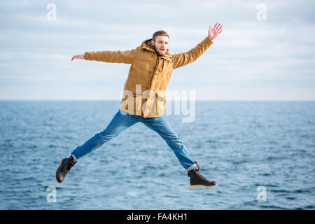 Portrait d'un homme drôle avec saut de fond de mer Banque D'Images