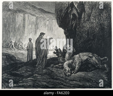 L'Inferno (la Vision de l'Enfer) par le 13c poète italien Dante Alighieri, illustré par le 19c artiste français Gustave Doré. Le troisième cercle de l'enfer, où la gourmandise n'est puni. Le chien à trois têtes Cerbère garde les gluttons. (Canto VI, lignes 24-26) Banque D'Images