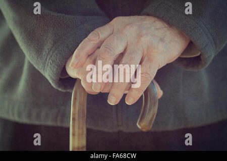 Close-up of a Man holding walking stick Banque D'Images