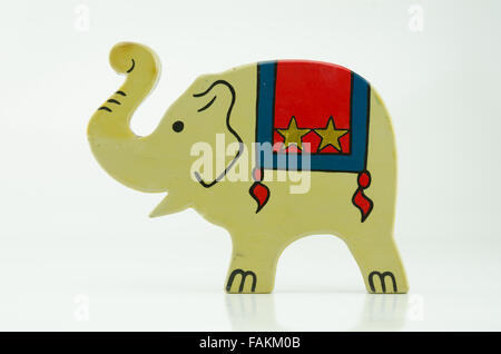 Un éléphant peint vintage toy on white Banque D'Images