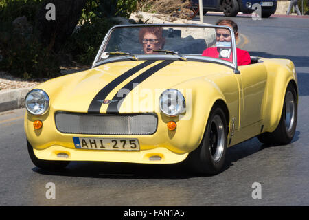 Une Austin Healey Sprite sur la route de voiture de sport à Malte Banque D'Images