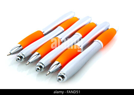 Orange et argent stylos isolated on white Banque D'Images