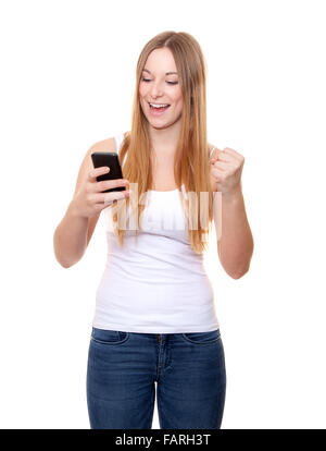 Attractive young woman with smart phone. Le tout sur fond blanc. Banque D'Images