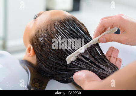 Les cheveux des clients est en cours de rénovation. Banque D'Images