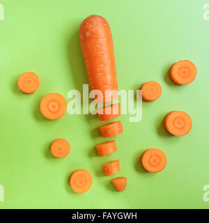 Ensemble de carottes sur un comptoir vert Banque D'Images