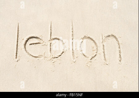 Leblon, un quartier adjacent à Ipanema, un message à la main sur une plage de sable fin à Rio de Janeiro, Brésil Banque D'Images