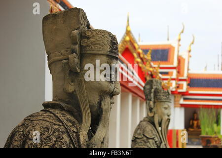 Tuteur chinois statue en Wat Pho à Bangkok Banque D'Images