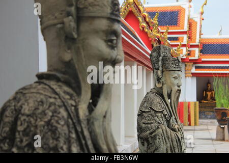 Tuteur chinois statue en Wat Pho à Bangkok Banque D'Images