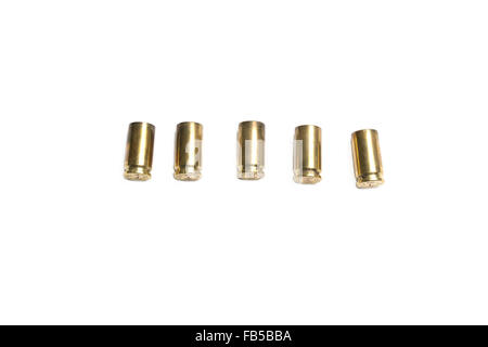 9mm vide bullet shells over white background Banque D'Images