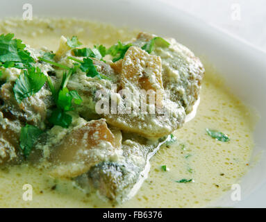 Coq au Riesling - de poulet sauce crème d'Alsace, vin et champignons Banque D'Images