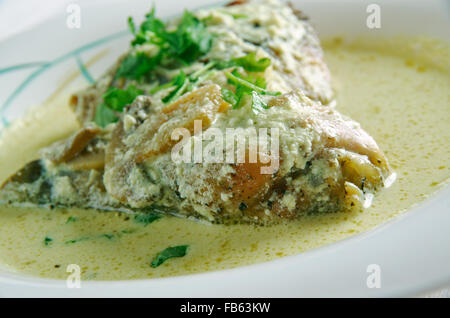 Coq au Riesling - de poulet sauce crème d'Alsace, vin et champignons Banque D'Images