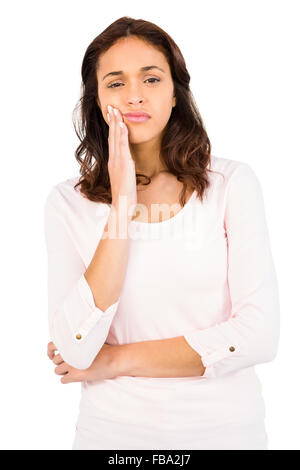 Portrait de sad woman holding her head Banque D'Images