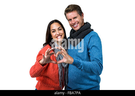 Portrait de couple avec les mains en forme de coeur Banque D'Images