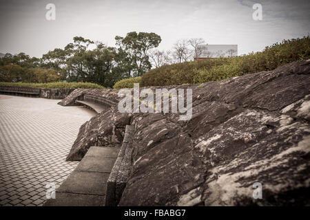 Vintage scène de mur de pierre en parc public. Banque D'Images