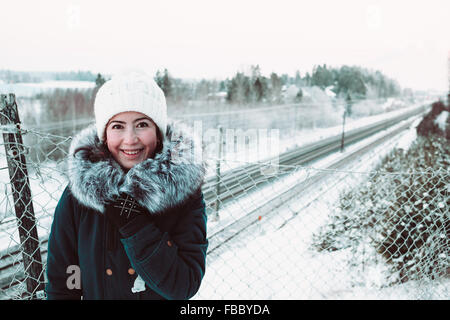 Beautiful Girl smiling in a white hat Banque D'Images