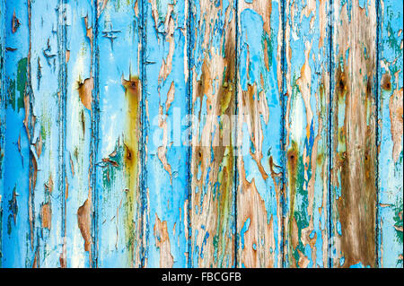 Peeling peinture bleu sur une surface en bois en arrière-plan Banque D'Images