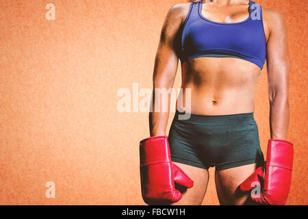 Image composite du milieu de boxer avec des gants Banque D'Images