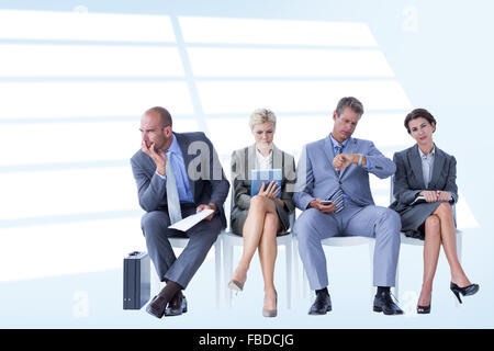 Image composite des gens d'affaires en attente d'être appelé en entrevue Banque D'Images