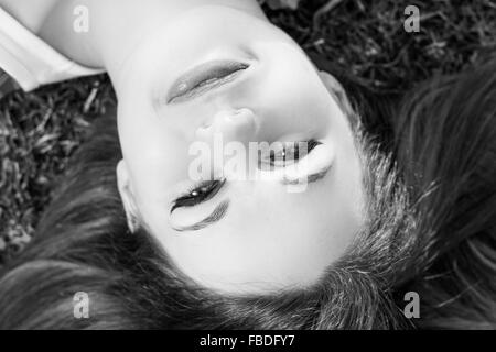 Close-Up Portrait Of A Smiling Young Woman