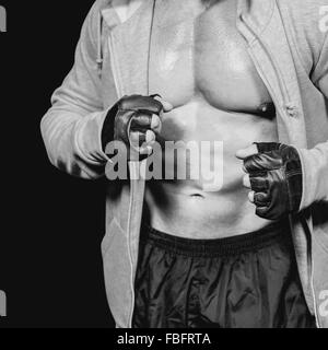 Image composite de Young dans le capot de l'athlète Banque D'Images