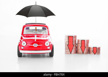 Une voiture avec un parapluie et la diminution des crédits, ce qui indique une diminution de la valeur/bénéfices Banque D'Images