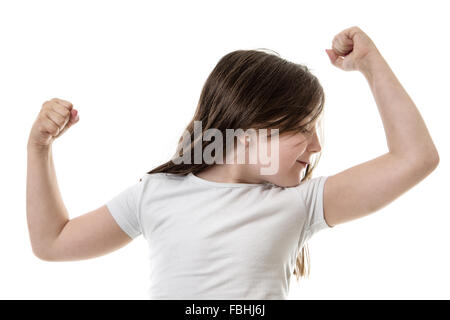 Portrait d'une jeune fille flexing muscles Banque D'Images