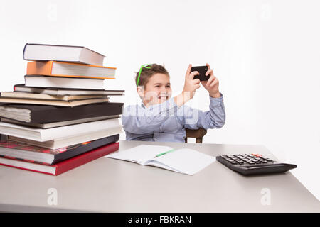 Petites affaires boy making photos Banque D'Images