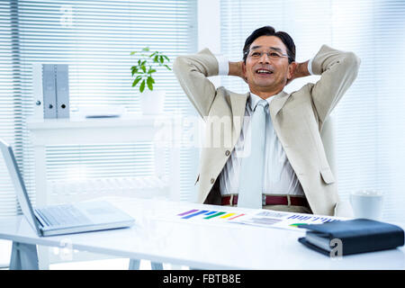 Portrait of smiling asian businessman Banque D'Images
